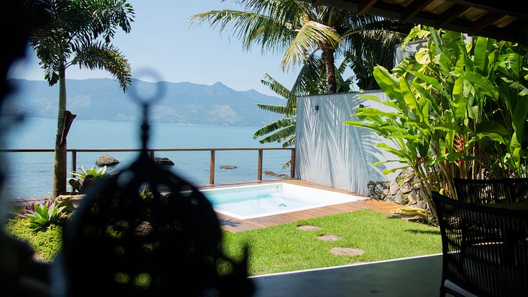Casa pé na áreia em frente à Ilhabela