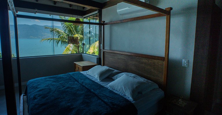 Casa pé na áreia em frente à Ilhabela